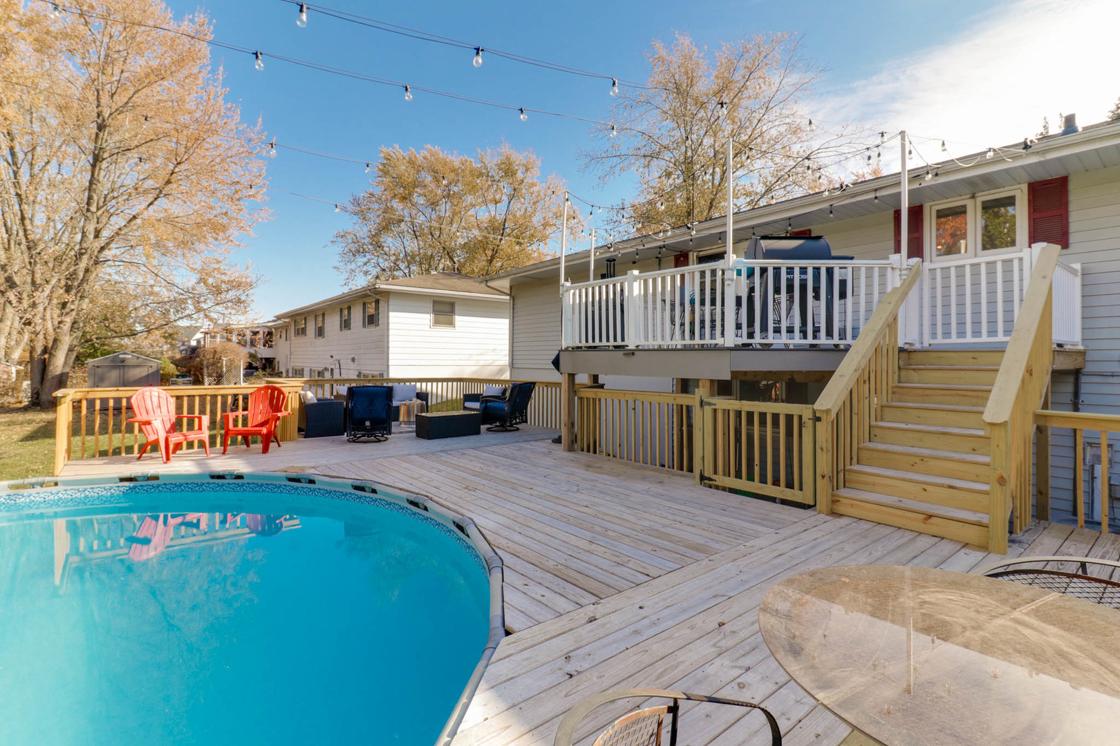 1222 Jersey Avenue Normal, IL 61761 - Photo 38 of 41 a view of a house with wooden deck and furniture