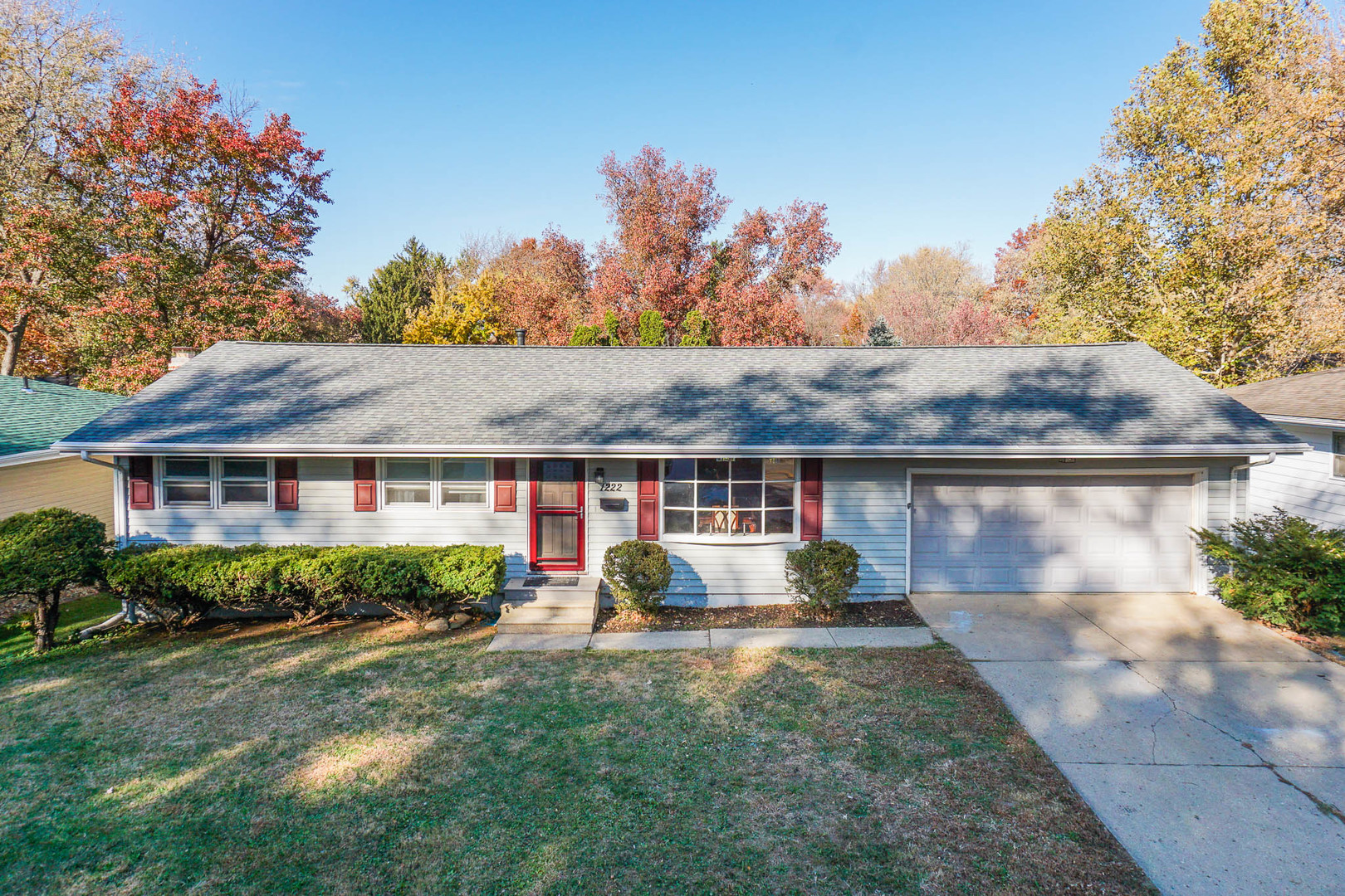 1222 Jersey Avenue Normal, IL 61761 - Photo 41 of 41 a front view of house with yard and trees in the background