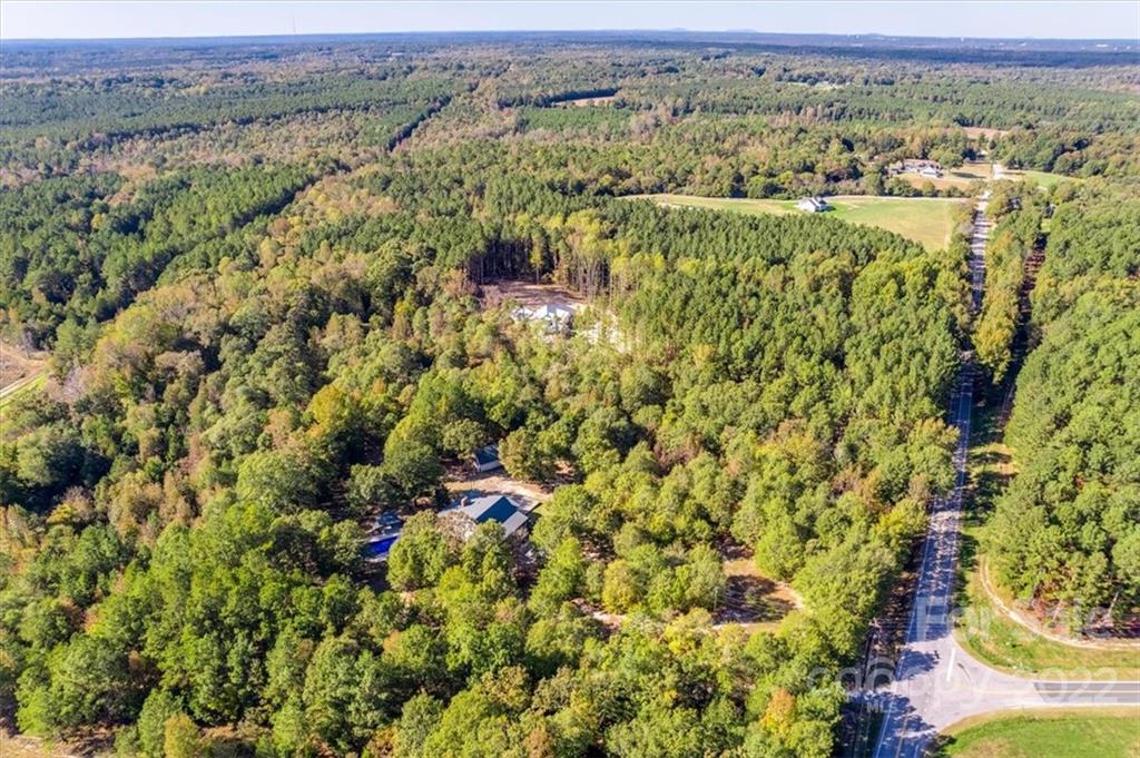 3725 Collins Road Edgemoor, SC 29712 - Photo 23 of 25 an aerial view of residential houses with outdoor space and trees
