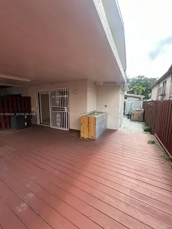 a view of a livingroom with furniture and wooden floor