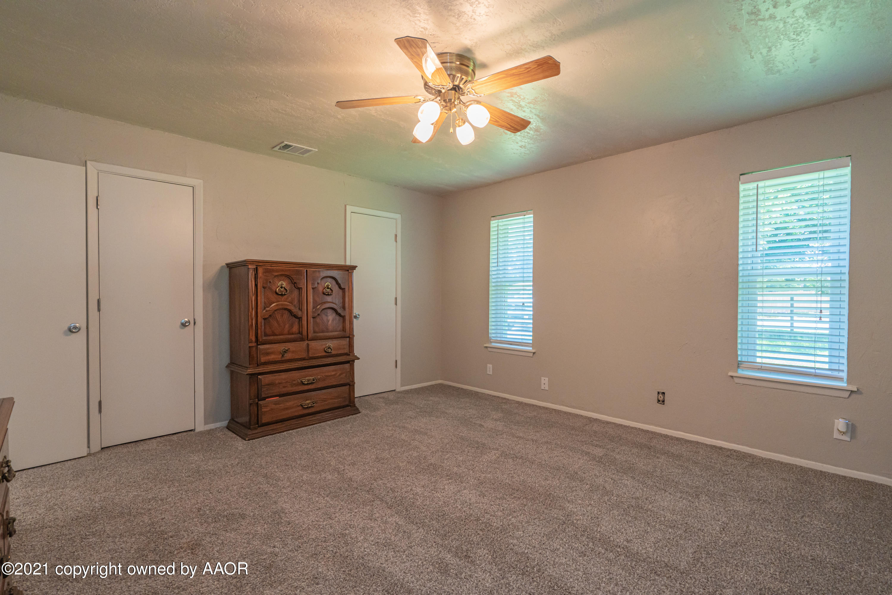 5308 Hillside Road Amarillo, TX 79109 - Photo 12 of 23 a view of an empty room with a window