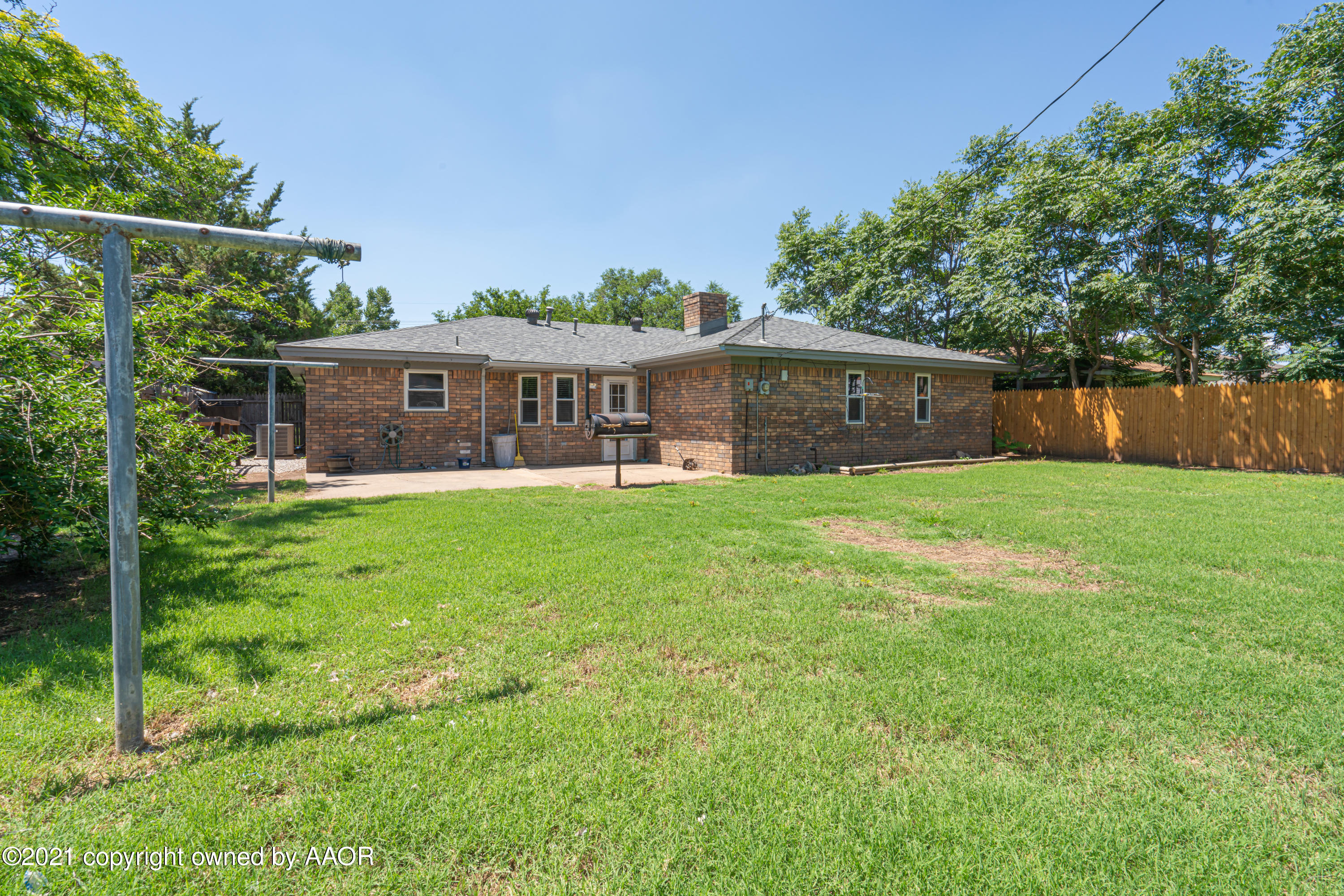 5308 Hillside Road Amarillo, TX 79109 - Photo 23 of 23 a view of a house with a yard and a porch
