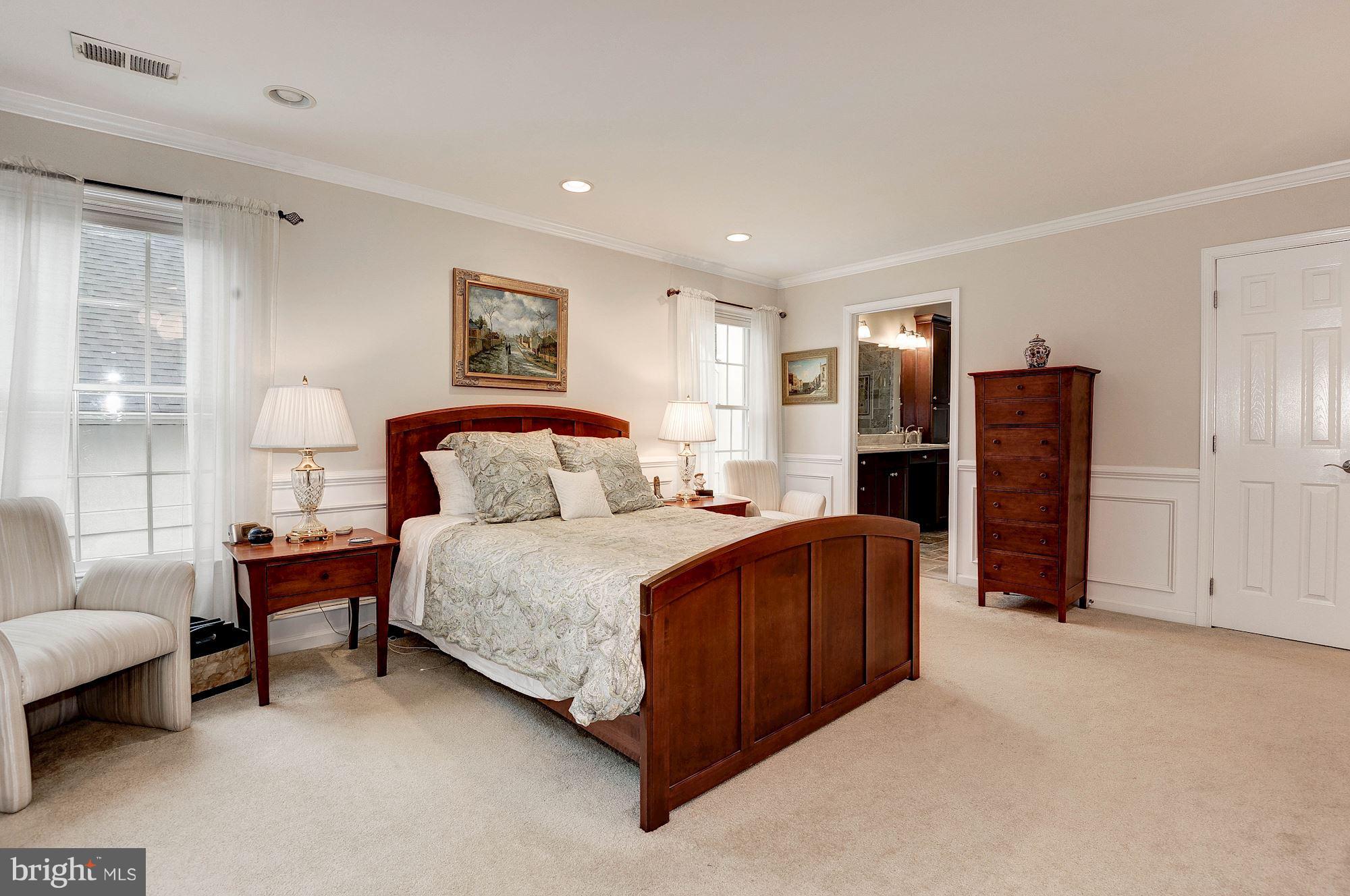 1328 Murray Downs Way Reston, VA 20194 - Photo 17 of 30 a bedroom with bed and window