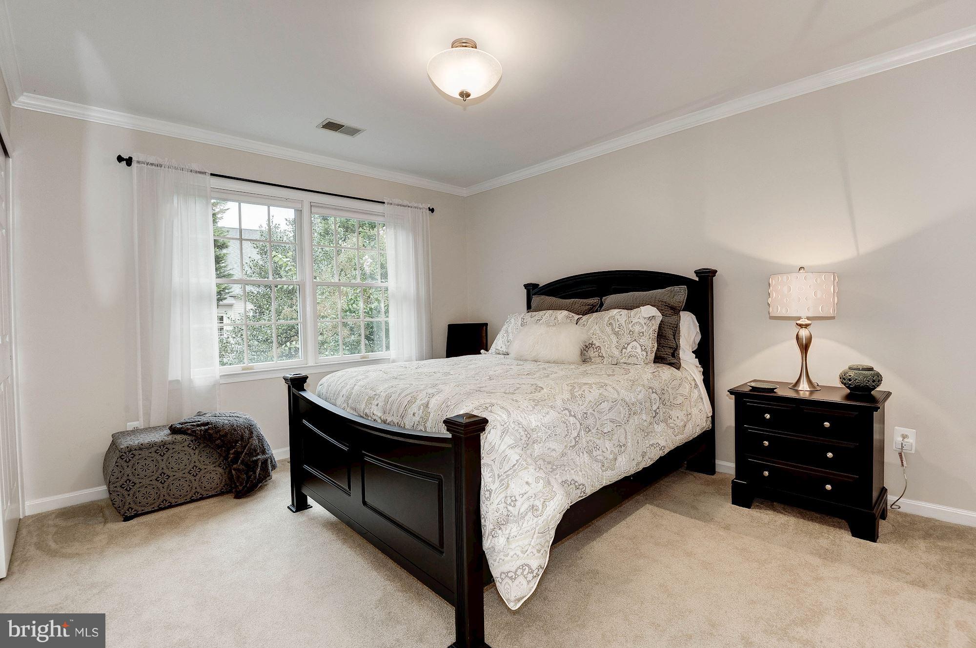 1328 Murray Downs Way Reston, VA 20194 - Photo 21 of 30 a bedroom with a bed and a window