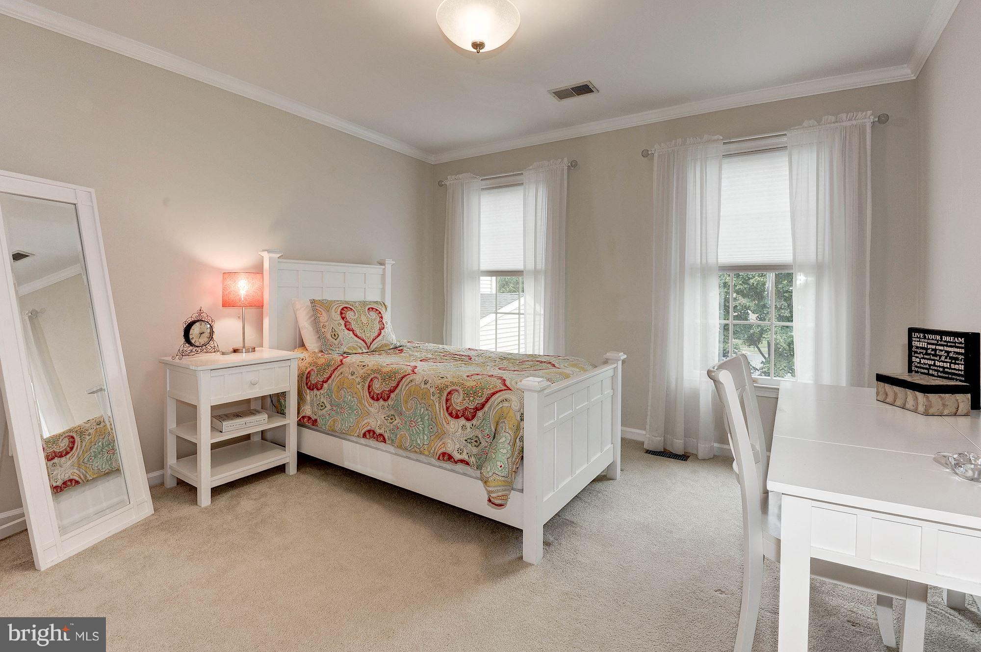 1328 Murray Downs Way Reston, VA 20194 - Photo 23 of 30 a bed room with a bed and a window