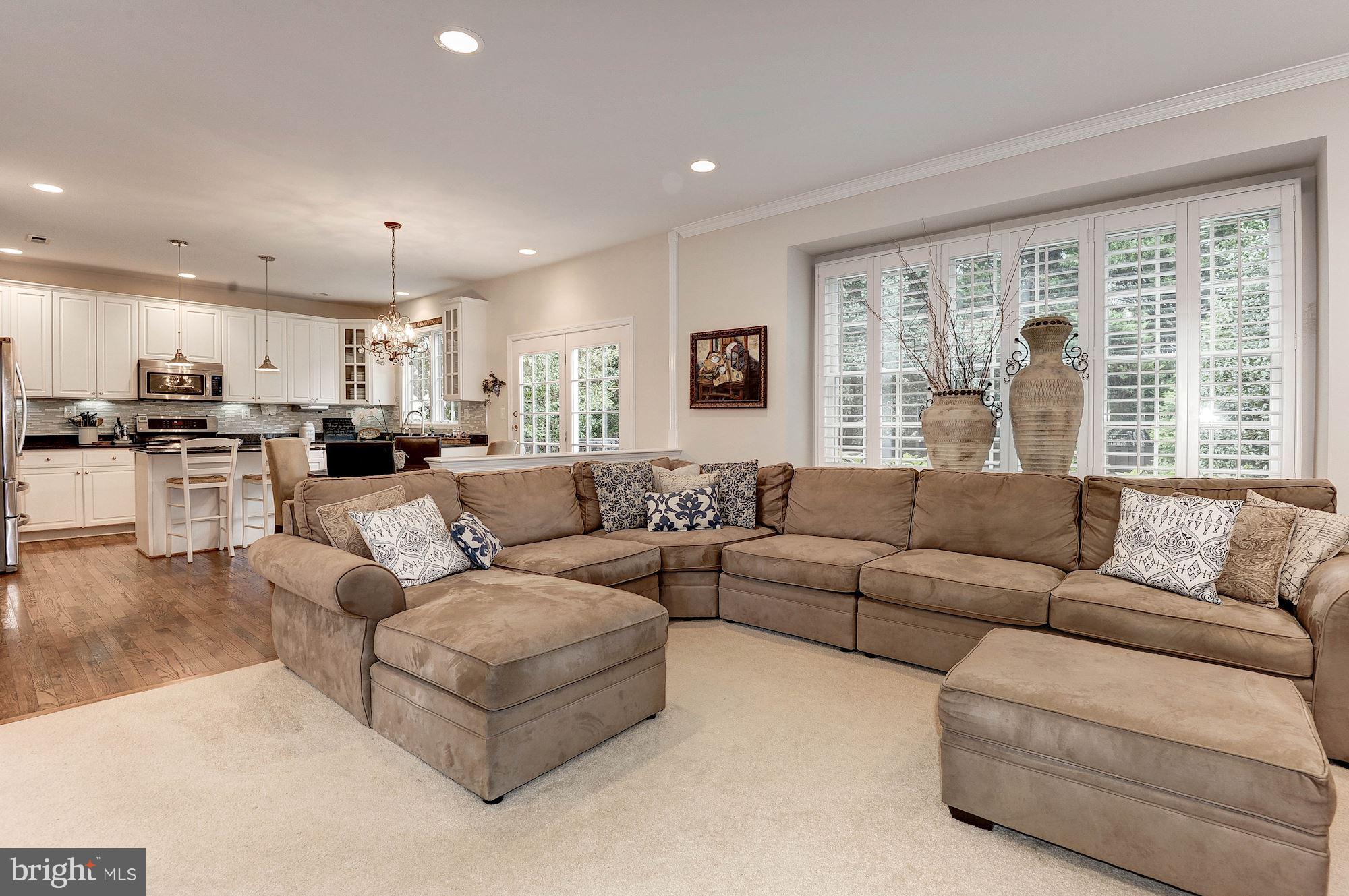 1328 Murray Downs Way Reston, VA 20194 - Photo 7 of 30 a living room with furniture and a large window