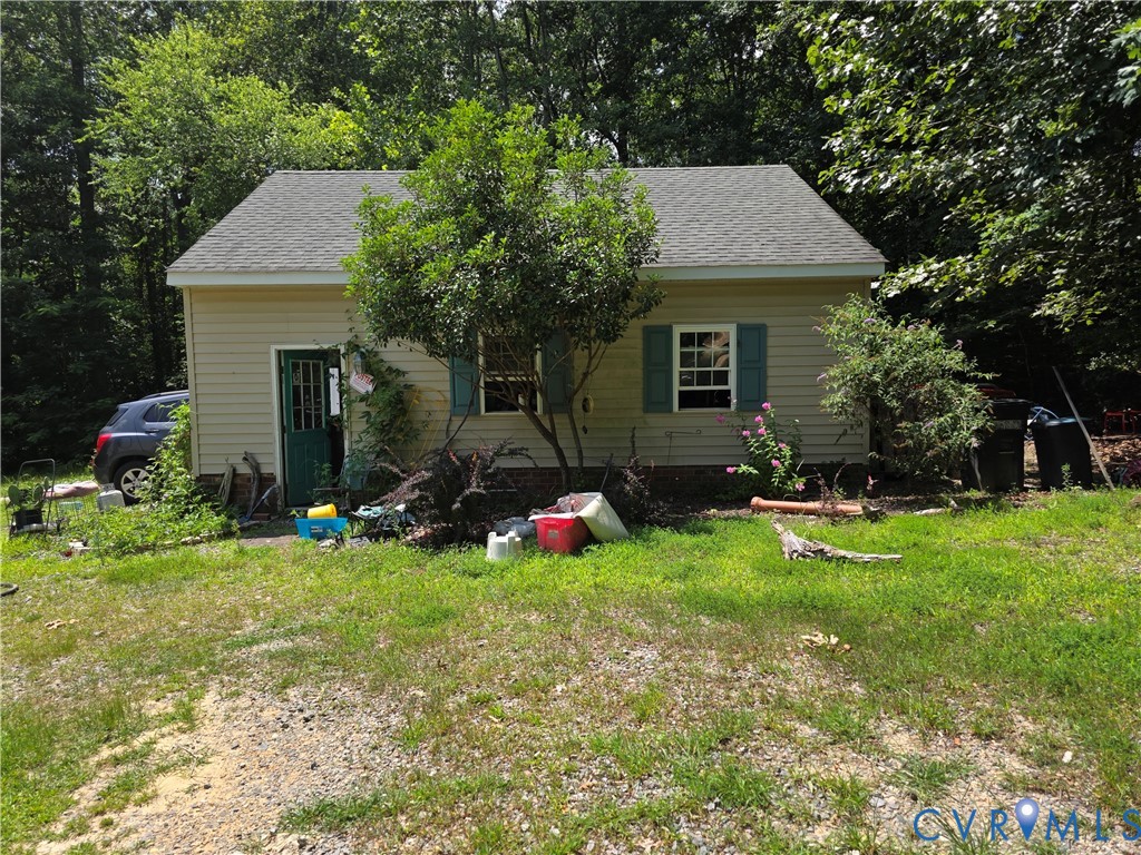 3161 Dorrell Road Aylett, VA 23009 - Photo 31 of 41 a view of house with backyard and outdoor seating