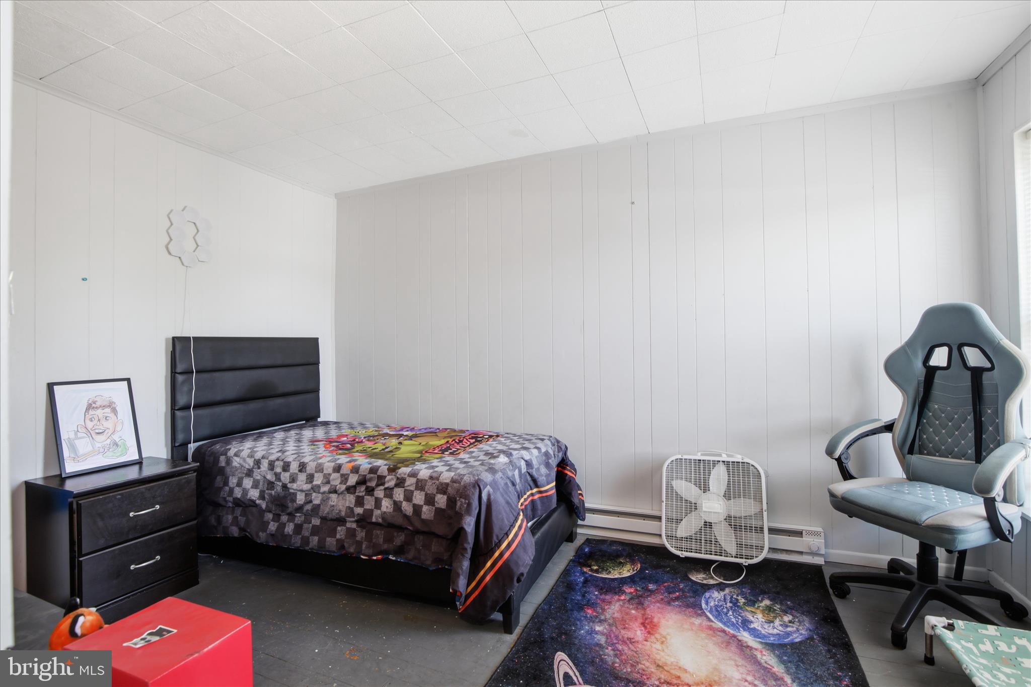 254 South 8th Street Lebanon, PA 17042 - Photo 21 of 25 a bedroom with a bed and wooden floor