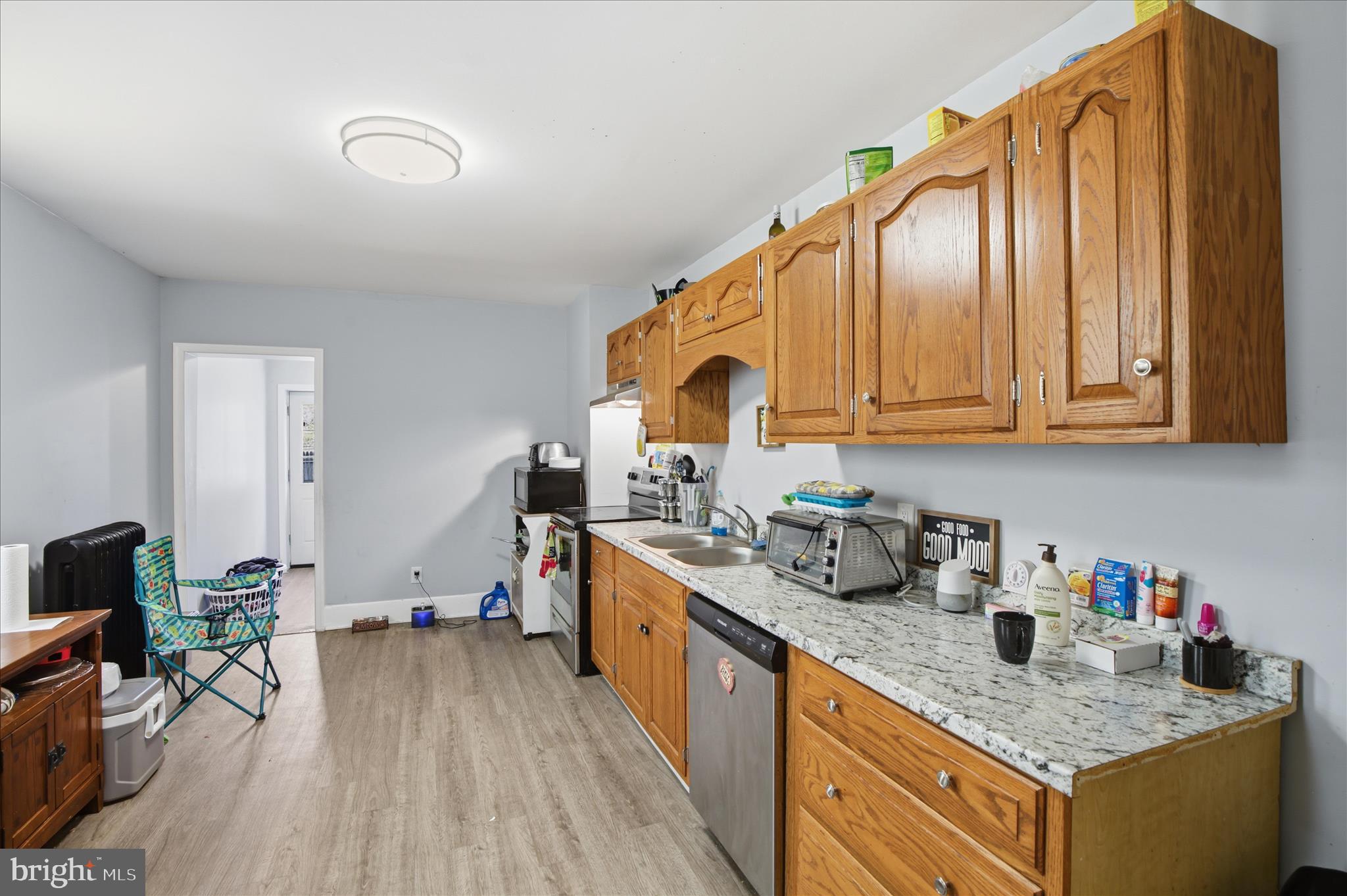 254 South 8th Street Lebanon, PA 17042 - Photo 10 of 25 a kitchen with stainless steel appliances granite countertop a sink stove and cabinets