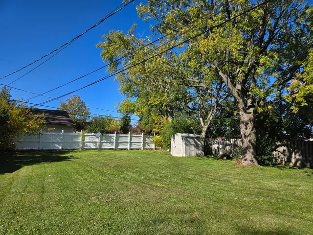 a view of a backyard with a garden