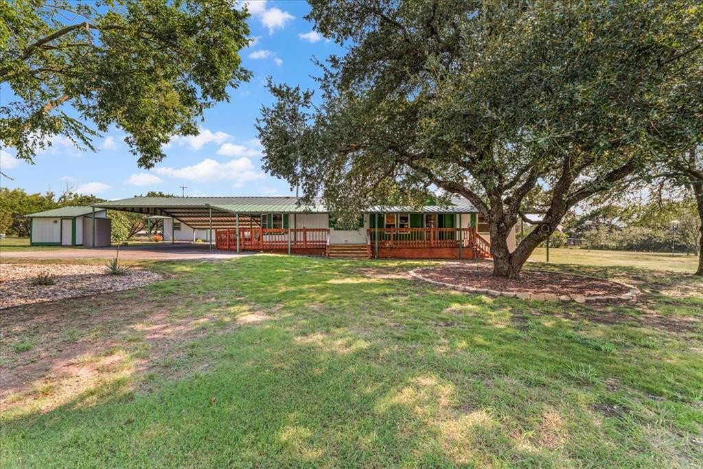 1849 Floyd Road Weatherford, TX 76087 - Photo 11 of 40 a view of a house with a yard