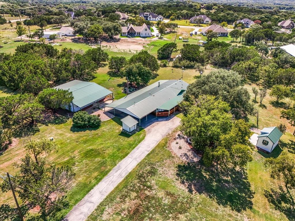 1849 Floyd Road Weatherford, TX 76087 - Photo 3 of 40 an aerial view of residential houses with outdoor space