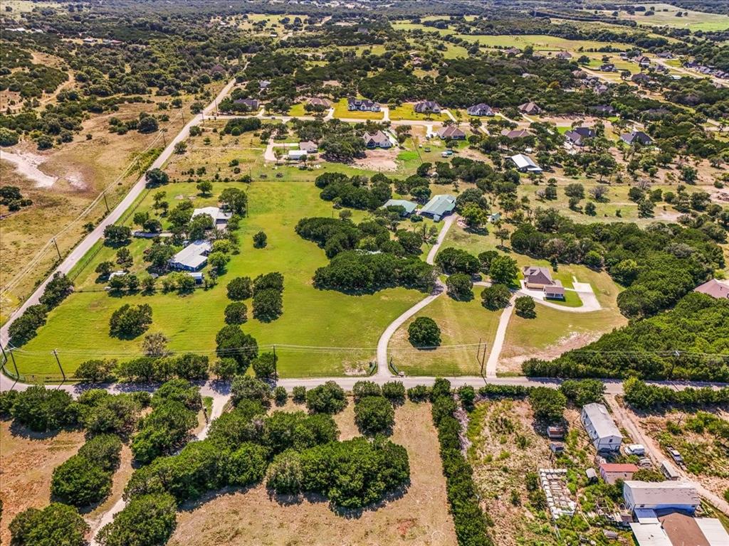 1849 Floyd Road Weatherford, TX 76087 - Photo 35 of 40 an aerial view of residential houses with outdoor space