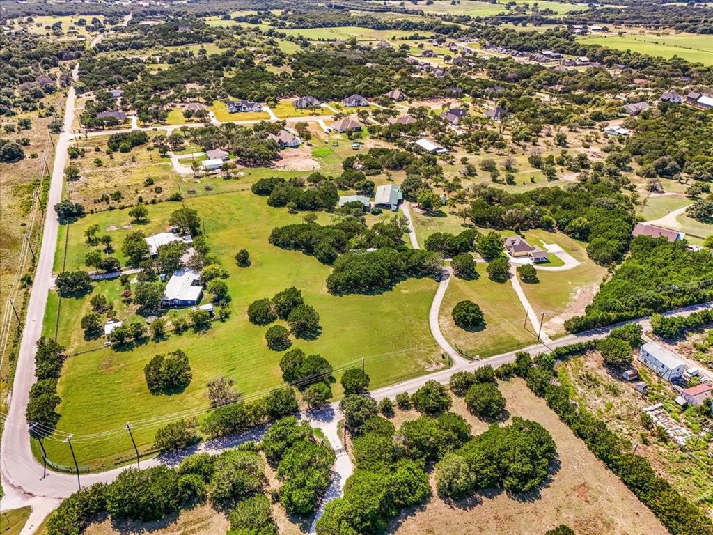 1849 Floyd Road Weatherford, TX 76087 - Photo 36 of 40 an aerial view of residential house with swimming pool