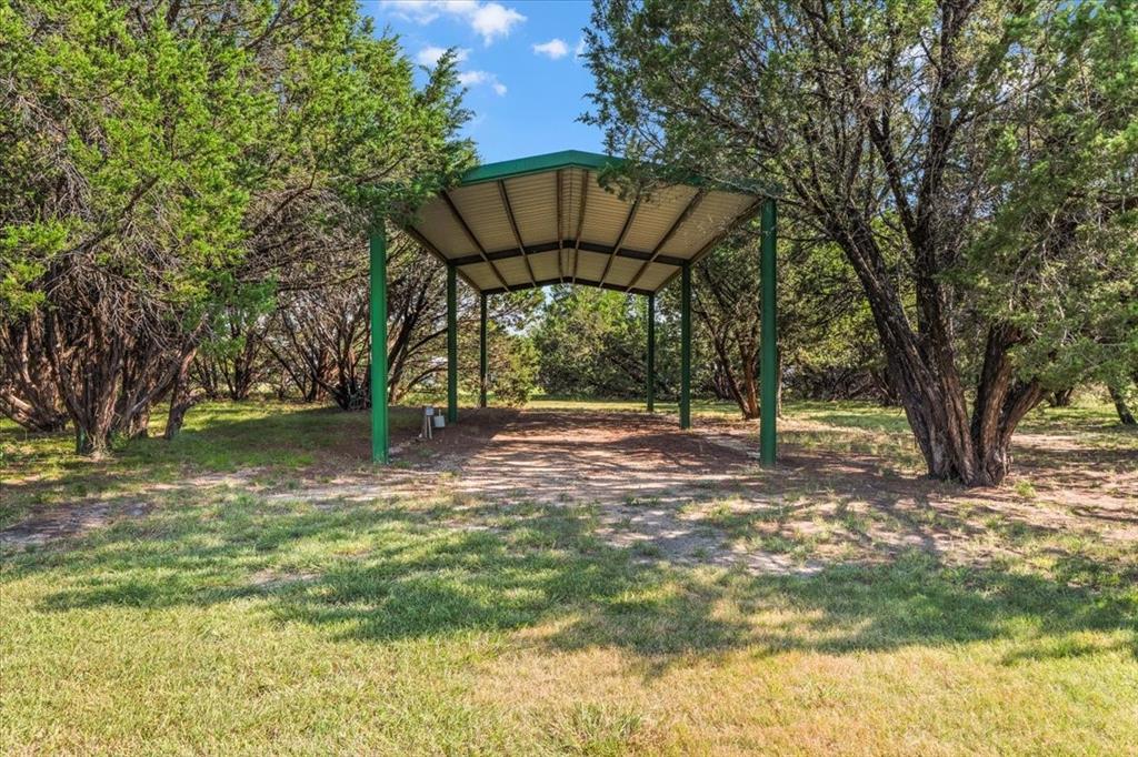 1849 Floyd Road Weatherford, TX 76087 - Photo 4 of 40 a view of a yard with a tree