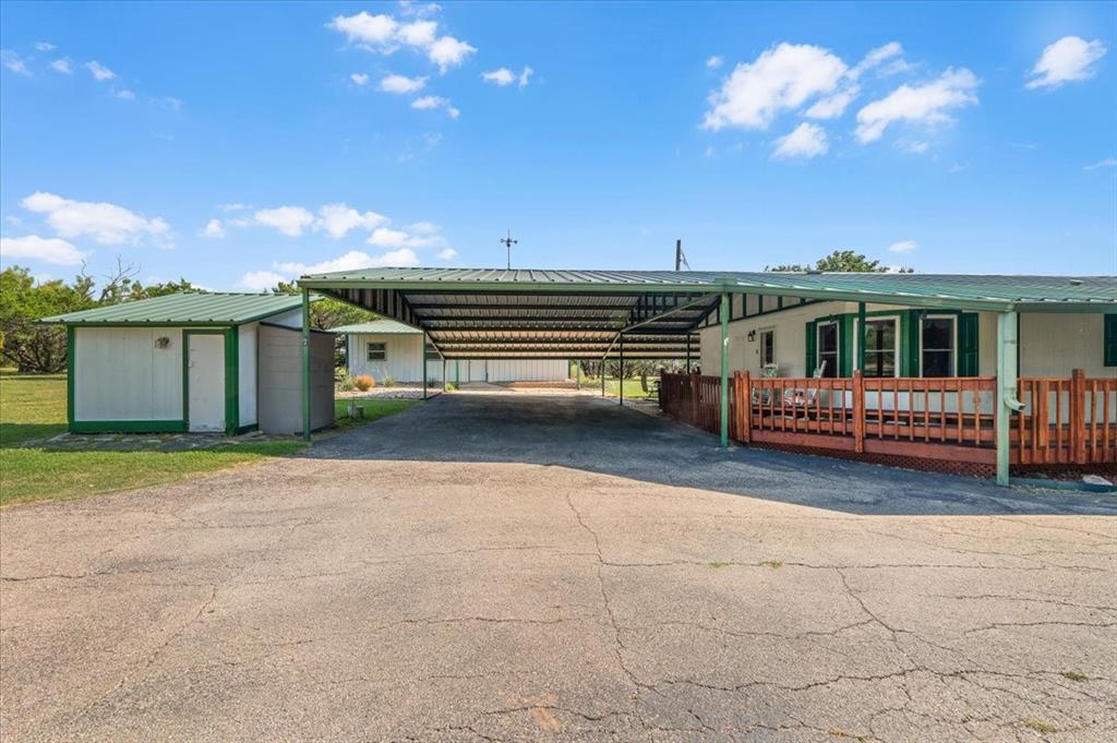 1849 Floyd Road Weatherford, TX 76087 - Photo 8 of 40 a view of a house with backyard and sitting area
