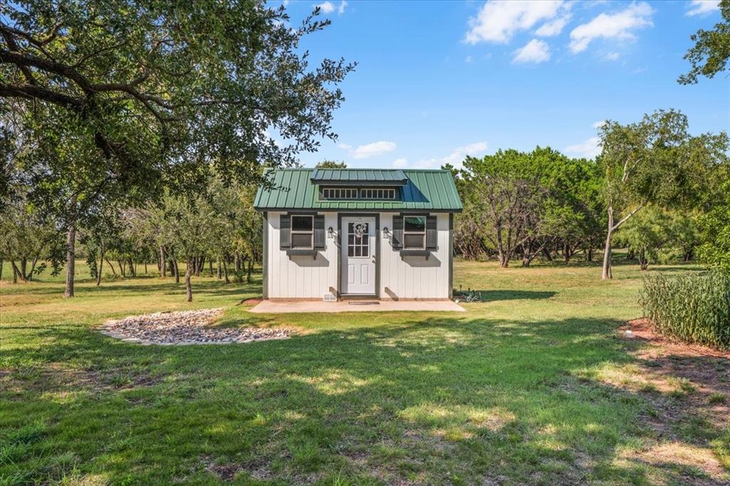 1849 Floyd Road Weatherford, TX 76087 - Photo 10 of 40 a view of a house with a big yard