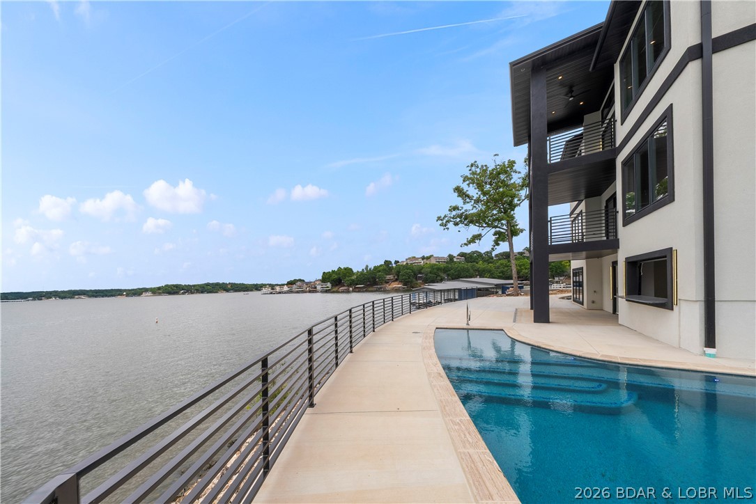 439 Red Bud Road Lake Ozark, MO 65049 - Photo 4 of 98 Resort-inspired pool overlooking panoramic lake vi