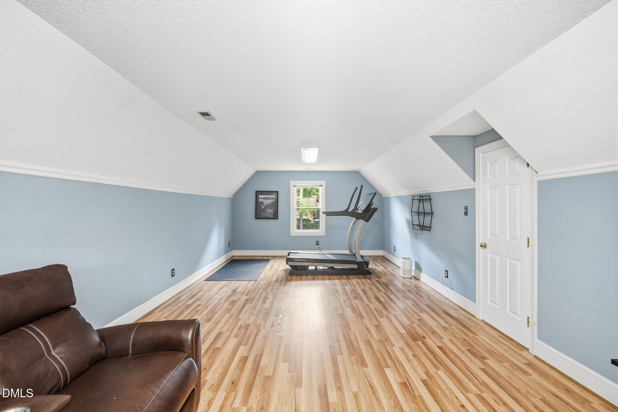 3735 Stoneybrook Drive Durham, NC 27705 - Photo 33 of 44 a view of a livingroom with wooden floor