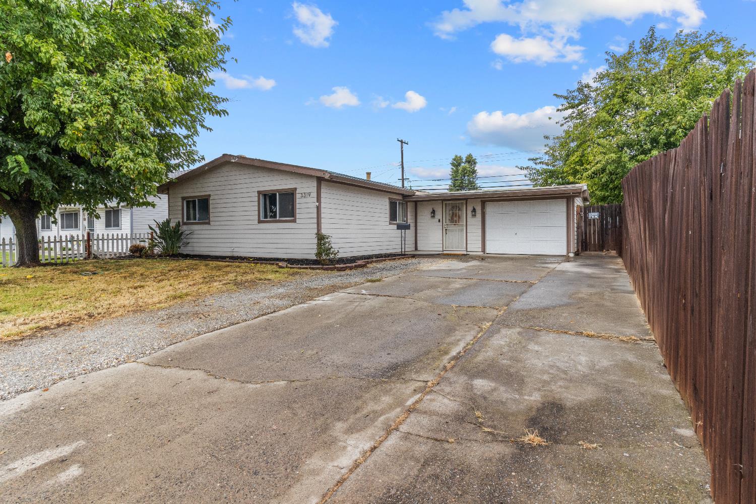3319 U Street Antelope, CA 95843 - Photo 13 of 14 a view of a house with a yard