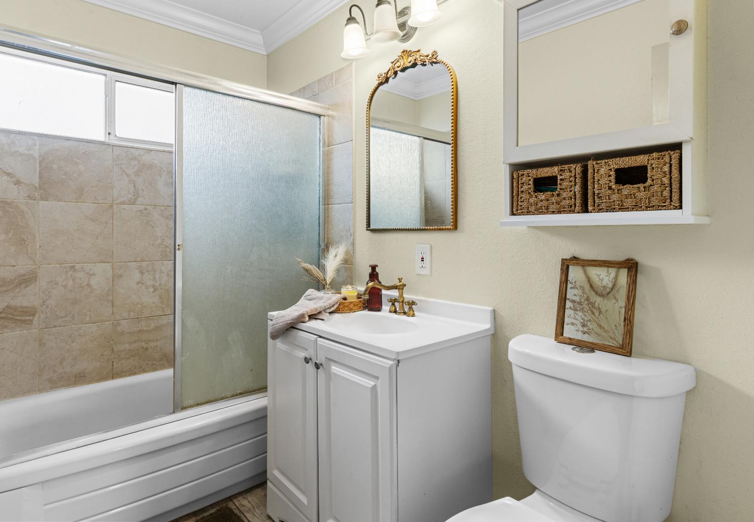 3319 U Street Antelope, CA 95843 - Photo 8 of 14 a bathroom with a sink a toilet and shower