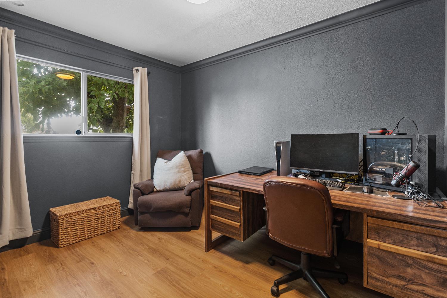 3319 U Street Antelope, CA 95843 - Photo 10 of 14 a view of a workspace with furniture and a window