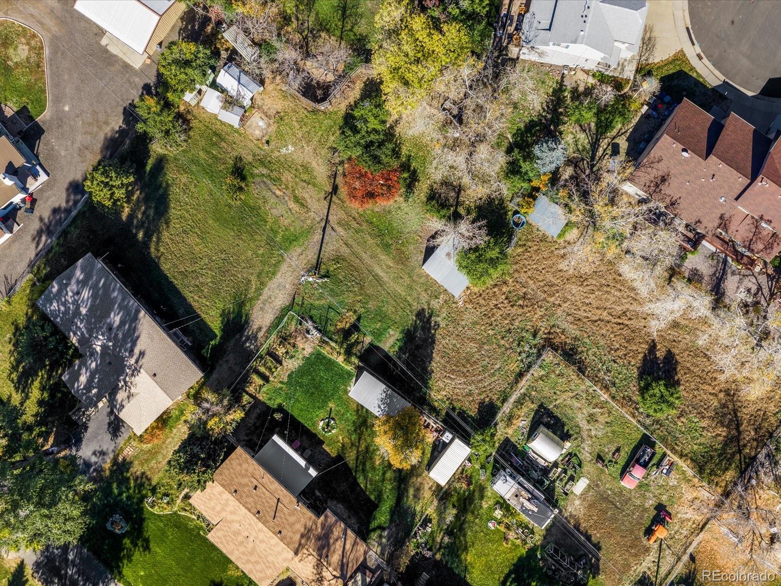 9815 West 37th Avenue Wheat Ridge, CO 80033 - Photo 45 of 50 an aerial view of a residential houses with outdoor space