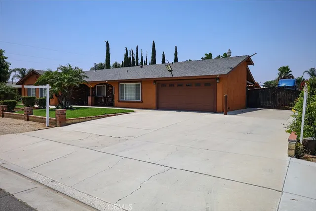 a view of house with outdoor space and street view