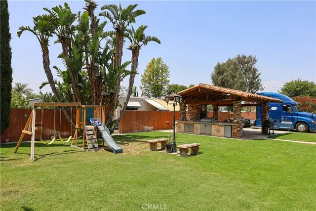 a view of a park with a slide