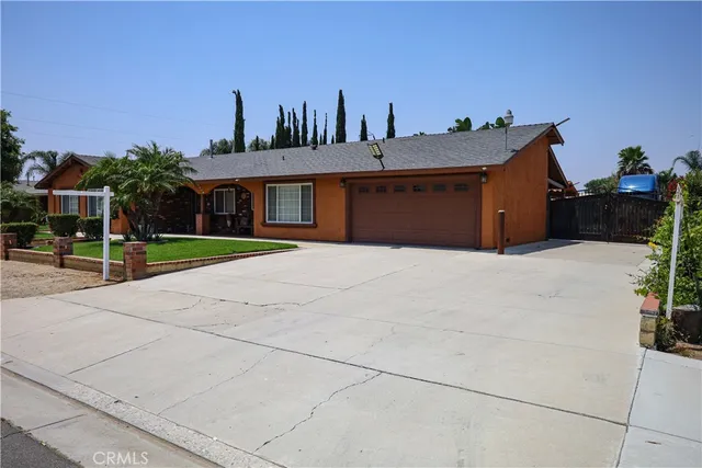 a view of house with outdoor space and street view