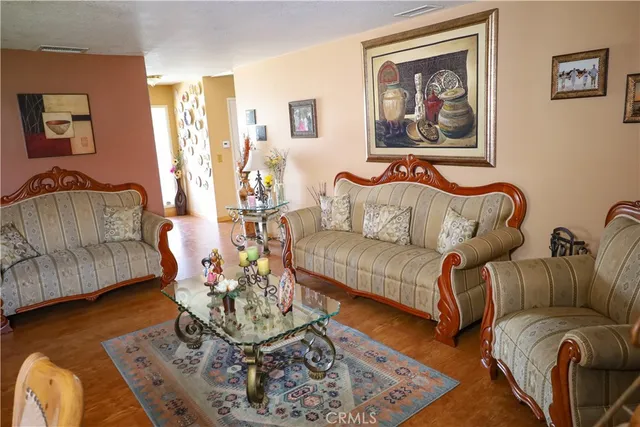 a living room with furniture and a couch