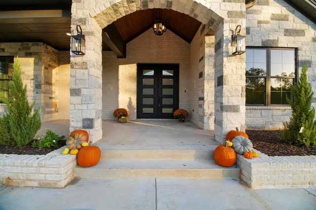 a front view of a house with patio