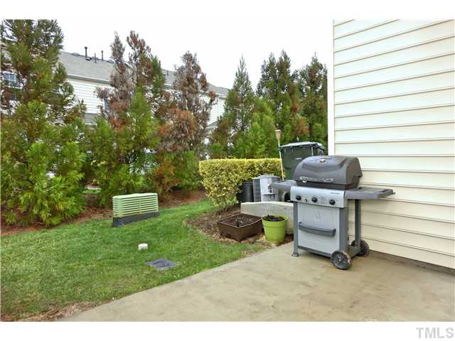 7818 Silverthread Lane Raleigh, NC 27617 - Photo 14 of 19 Large back patio with private buffer on both sides away from neighbors and a line of leeland cypress planted for privacy at the back too. Plenty of room for grilling and entertaining!