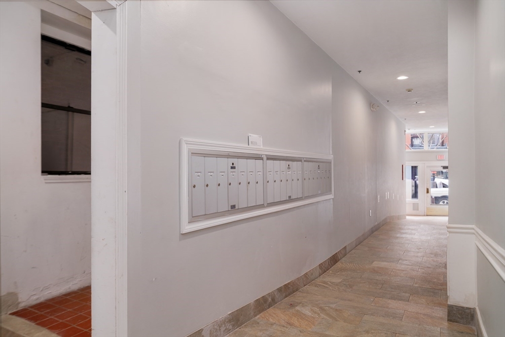 188 North Street, Unit 22 Boston, MA 02113 - Photo 16 of 18 a view of a hallway with wooden floor