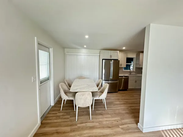 a view of a dining room with furniture