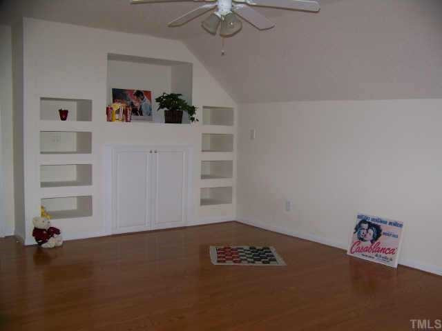 7117 Missionary Ridge Drive Raleigh, NC 27610 - Photo 9 of 12 Kick back & watch your favorite movie or sports events! The wall of media cabinets provides space for your wide screen TV, your surround speakers, DVD's & other components in your very private theater room! Easy to clean parquet floors! Other