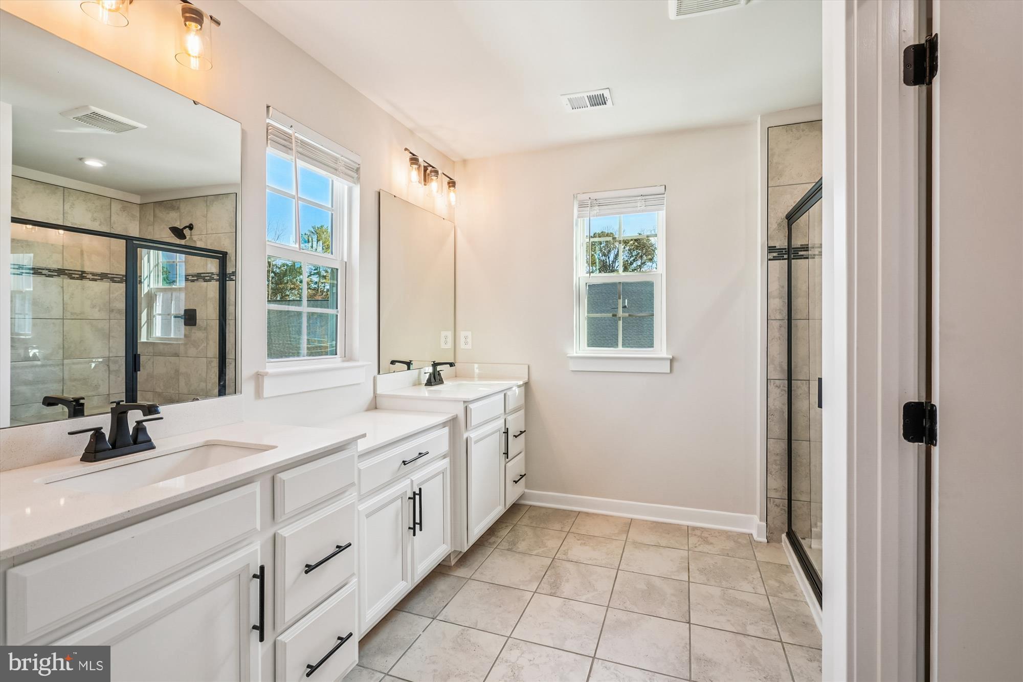 105 Driscoll Lane Stafford, VA 22554 - Photo 25 of 69 a bathroom with a double vanity sink mirror and double