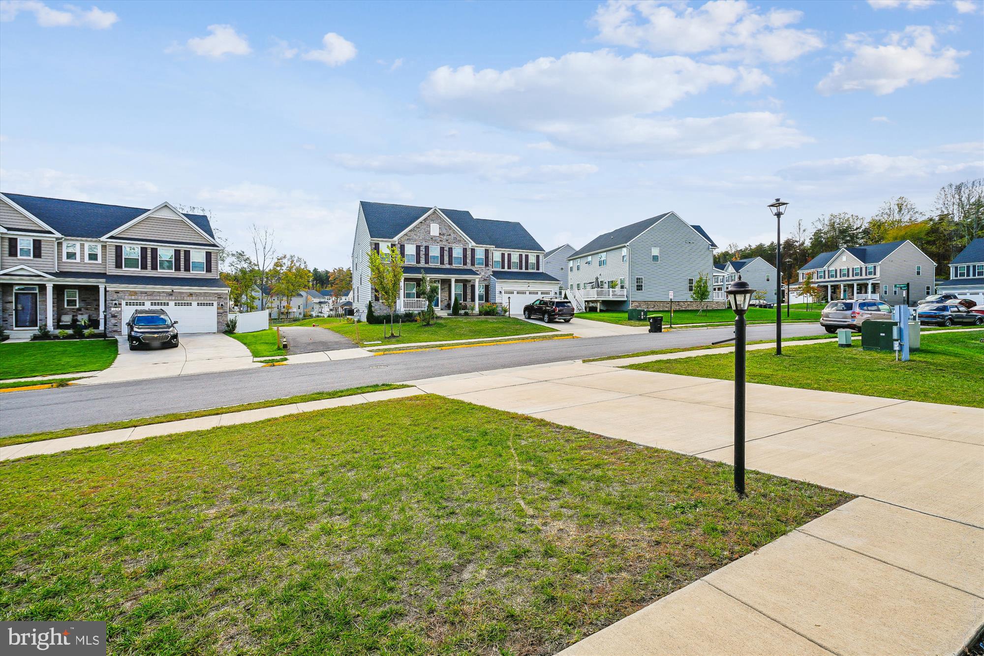 105 Driscoll Lane Stafford, VA 22554 - Photo 65 of 69 a view of a big house with a big yard and palm trees