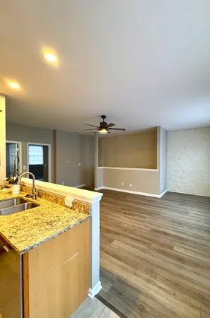 a bathroom with a sink a toilet and a bathtub