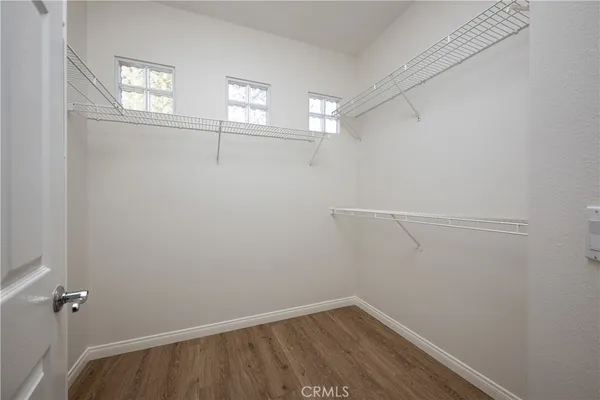a view of a room with racks on the wall