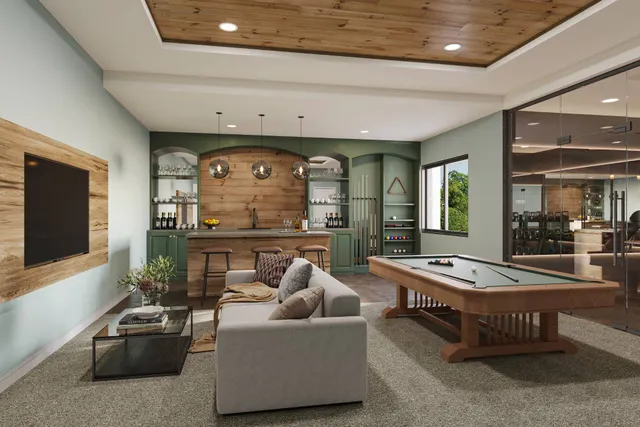 a living room with large windows