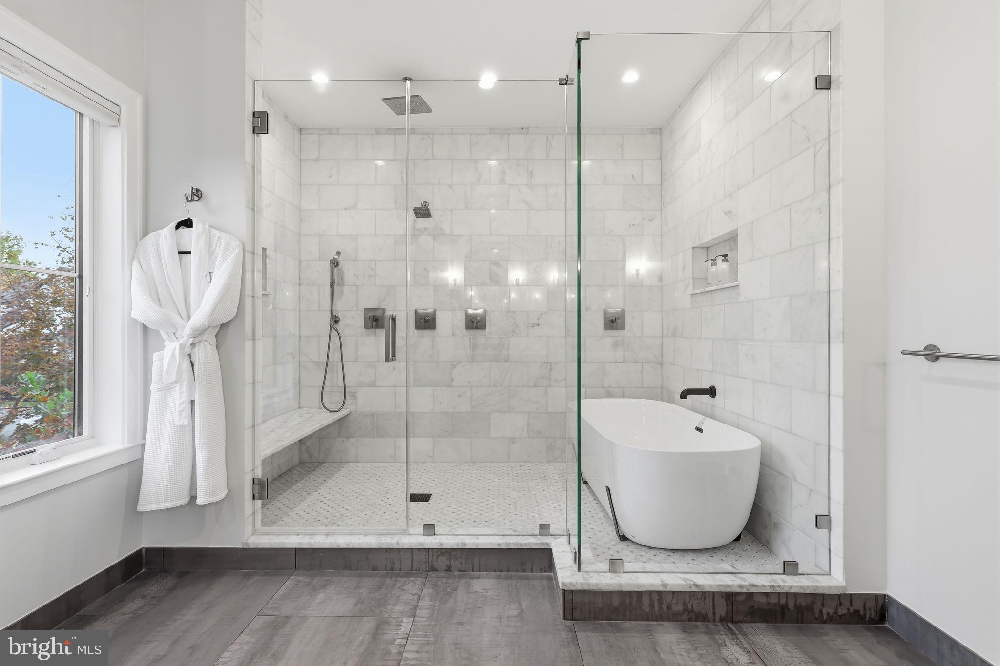 7000 Hector Road McLean, VA 22101 - Photo 23 of 50 a bathroom with a shower a mirror and a shower