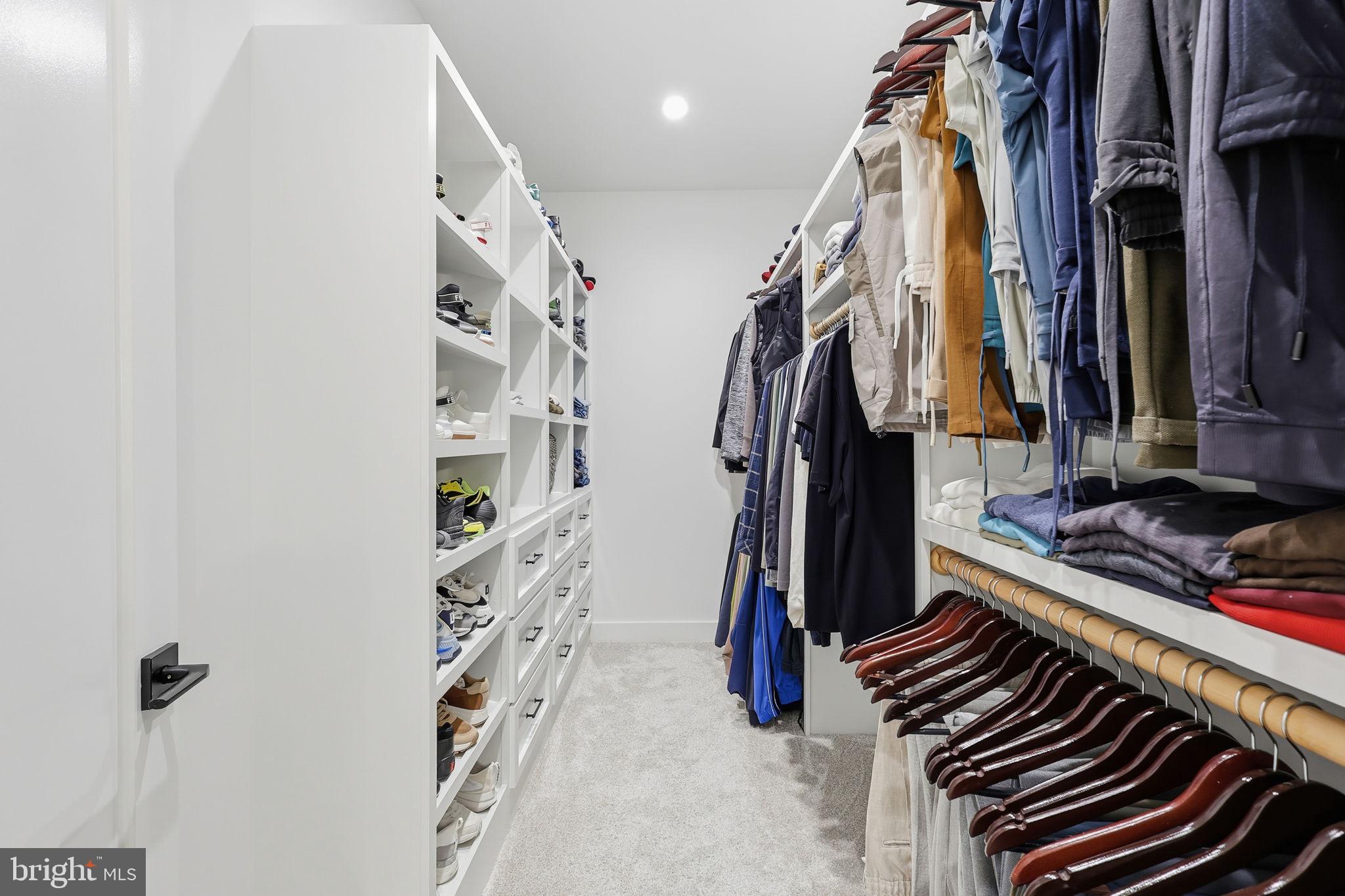 7000 Hector Road McLean, VA 22101 - Photo 26 of 50 a view of walk in closet with clothes and shoes