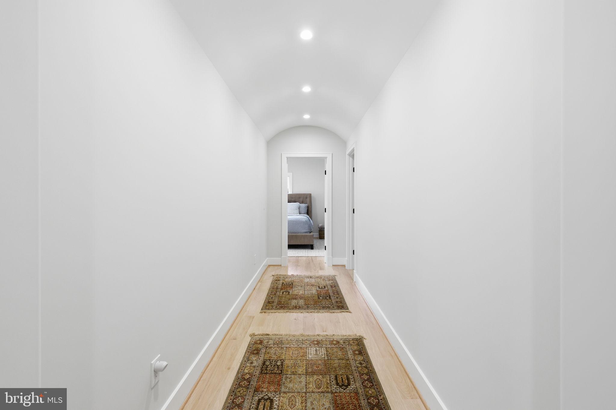 7000 Hector Road McLean, VA 22101 - Photo 27 of 50 a view of a hallway with wooden floor