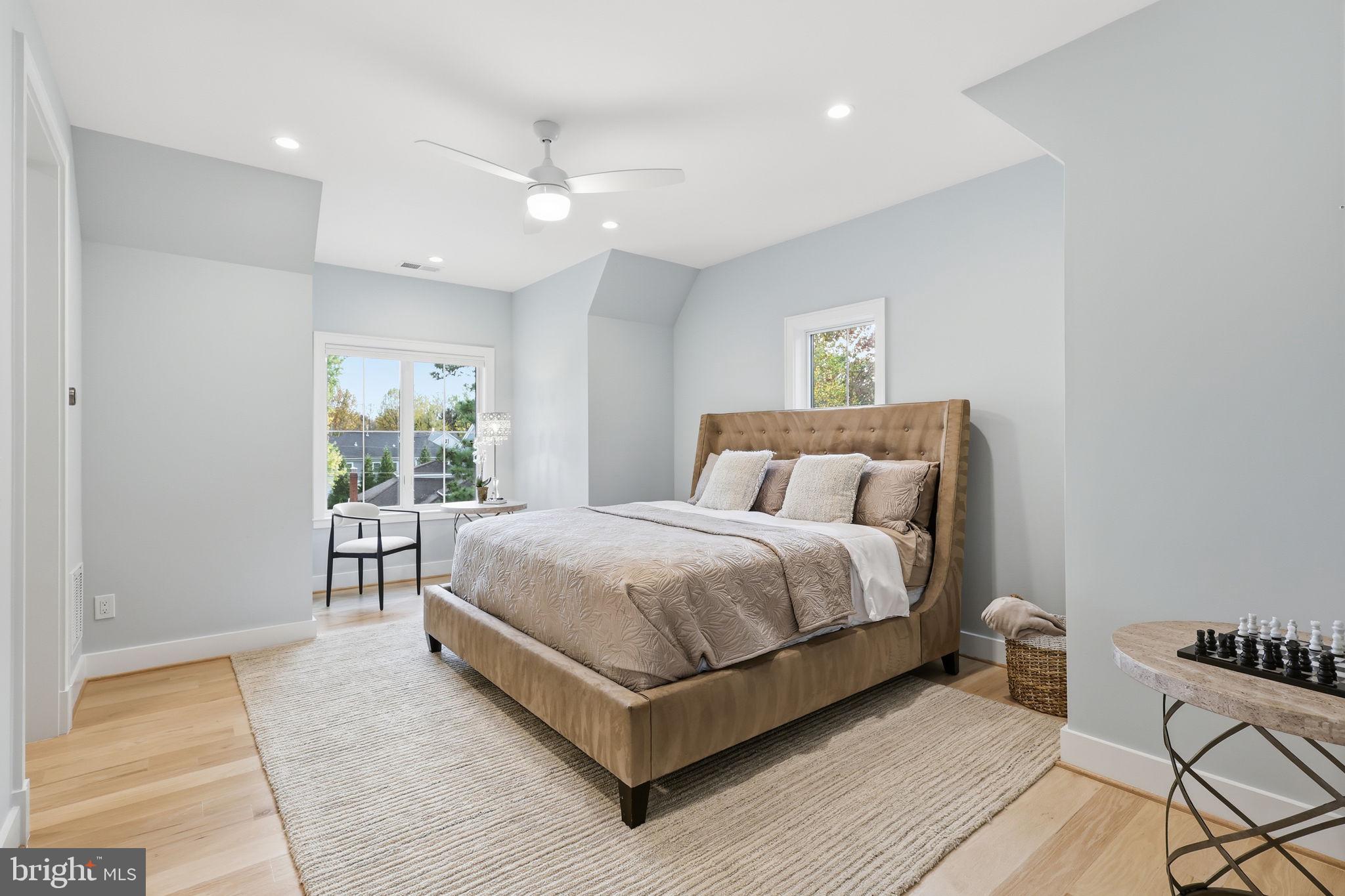 7000 Hector Road McLean, VA 22101 - Photo 28 of 50 a bedroom with a bed and a table