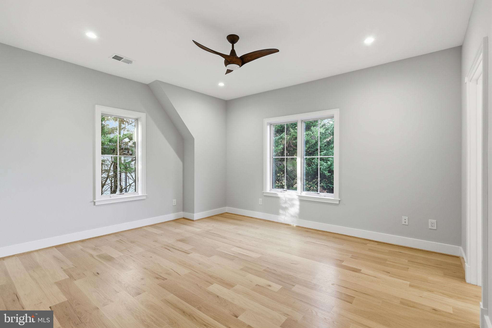 7000 Hector Road McLean, VA 22101 - Photo 30 of 50 a view of a livingroom with a ceiling fan and window
