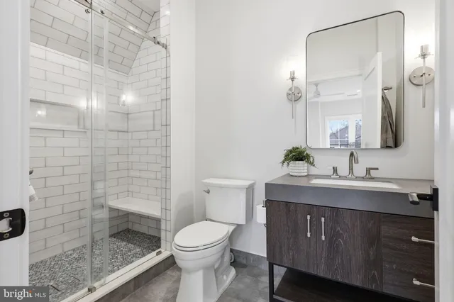 a spacious bedroom with a large bed and a window