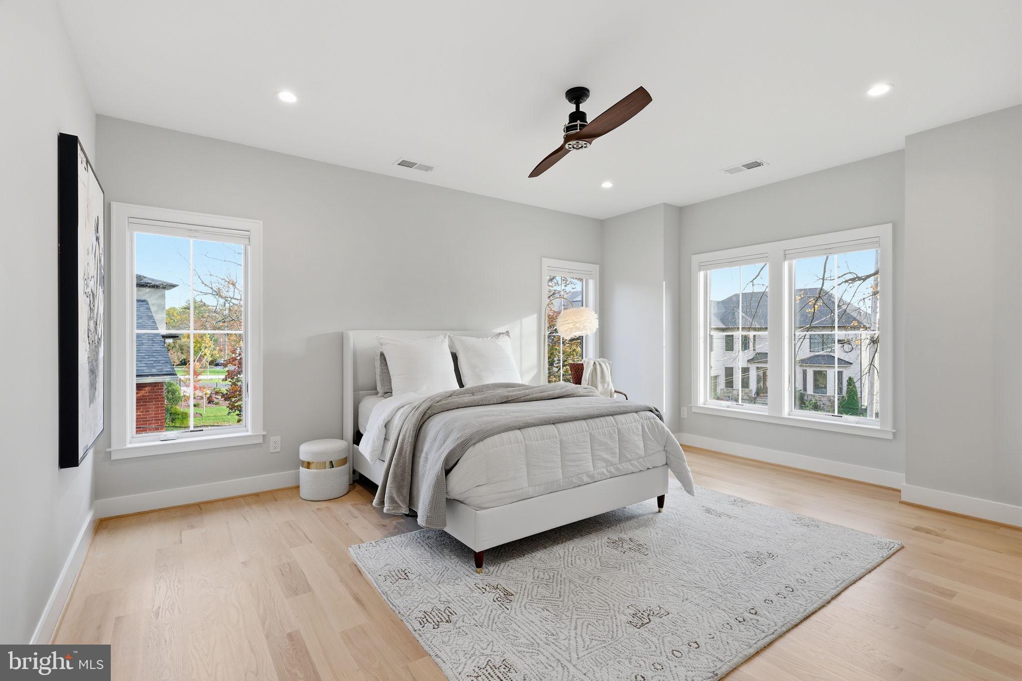 7000 Hector Road McLean, VA 22101 - Photo 34 of 50 a spacious bedroom with a large bed and a window