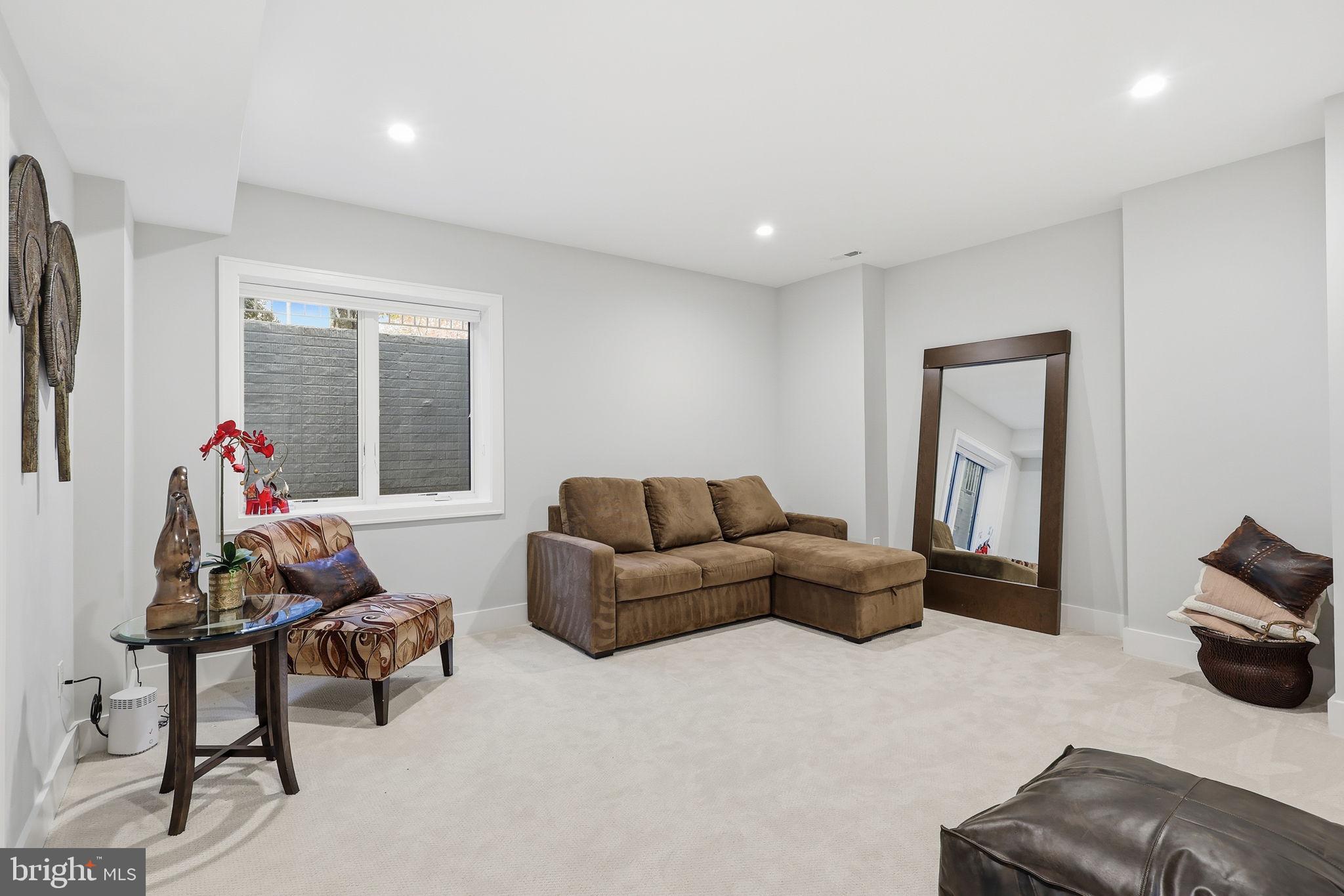 7000 Hector Road McLean, VA 22101 - Photo 42 of 50 a living room with furniture and a large window