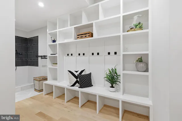 a bathroom with a bathtub and shower